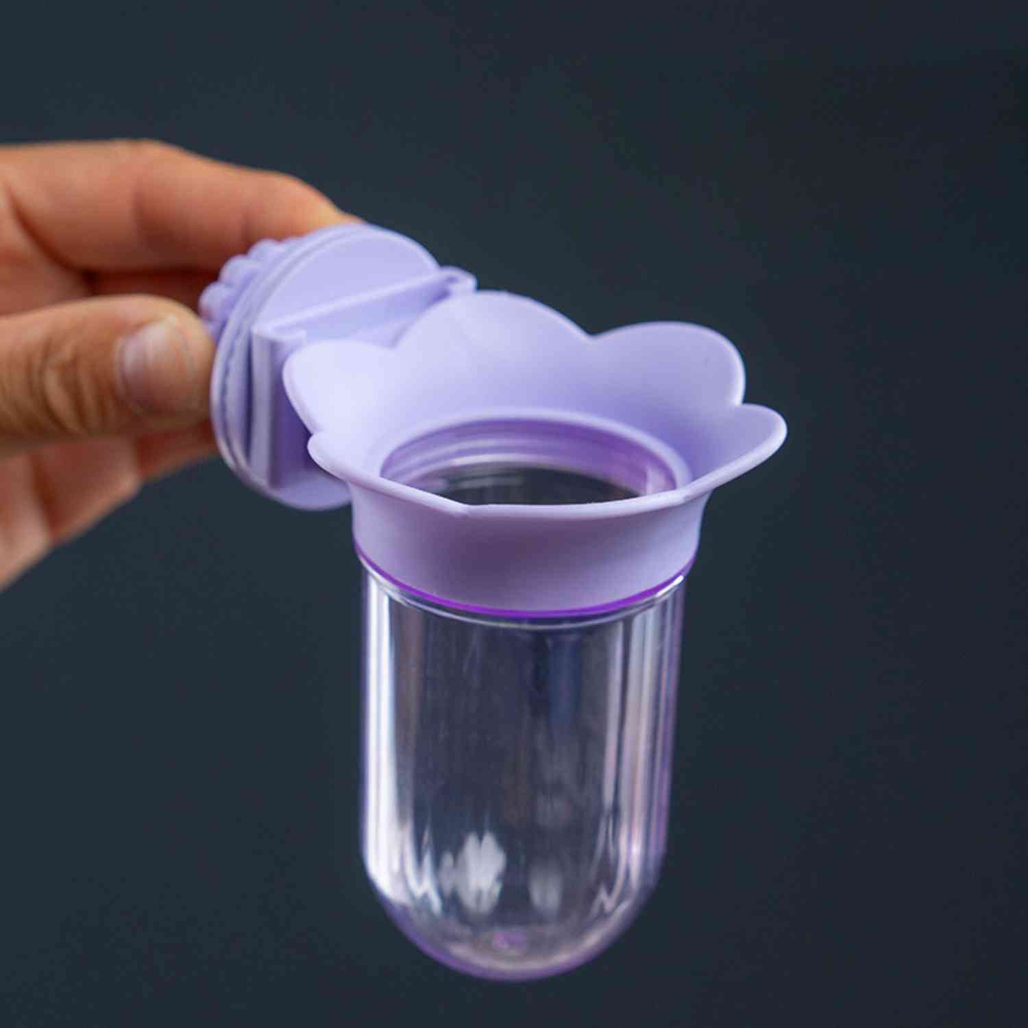 papegaai hydroponische fles lila handmatige montage close up